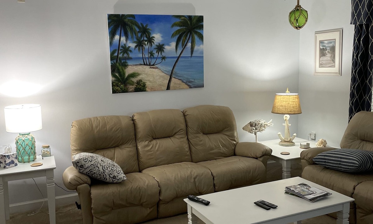 Calabash Condo | First floor corner unit overlooking 11th fairway on premier golf course.