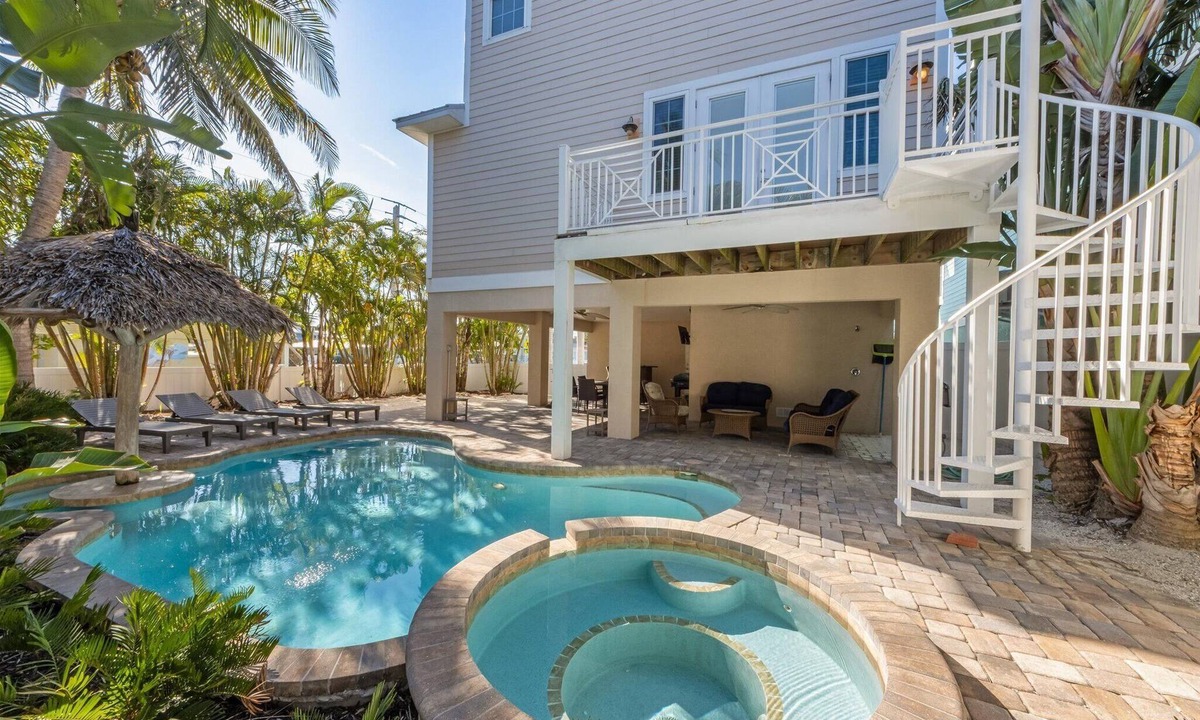 Holmes Beach House | For Shore: Sleeps 10, steps to beach, heated pool!