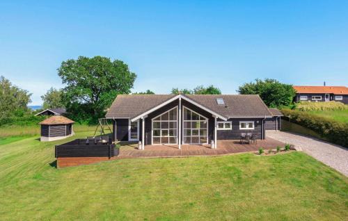 Spodsbjerg House | Four-Bedroom Holiday Home In Rudkobing