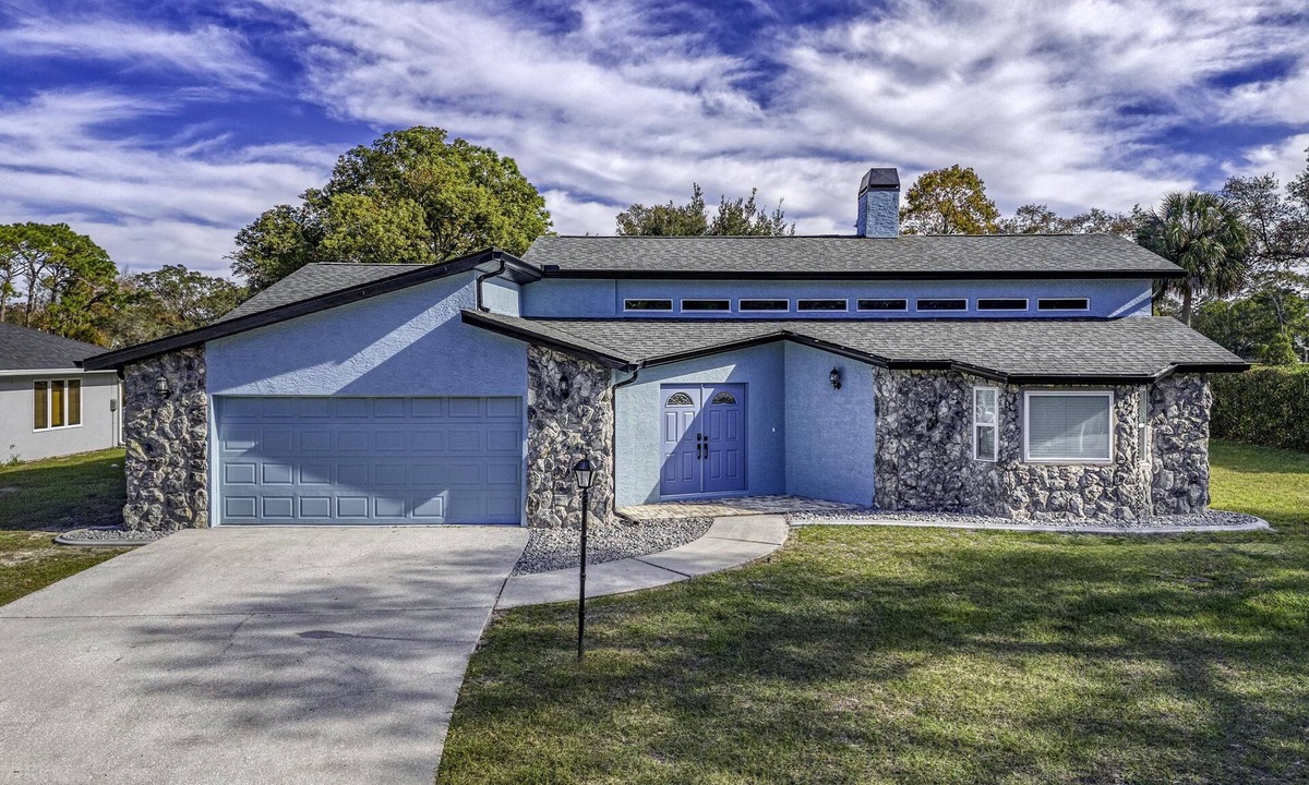 Spring Hill House | Four Beds, three baths, heated pool, and a Golf Course. What more do you need!