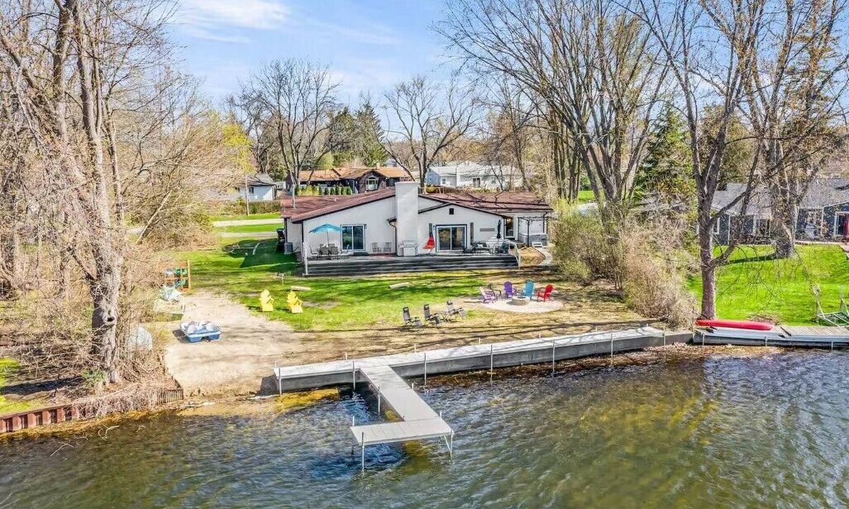 Commerce Township House | Fox Lake Retreat | Dock, Hot Tub, Sauna & Gameroom