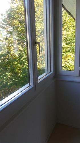 District 7 Apartment | Gästezimmer mit Gartenblick
