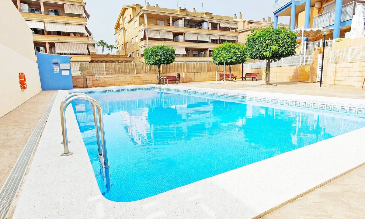 Canet de Berenguer Apartment | Global Vacacional: Apartment with pool and terrace in Canet beach