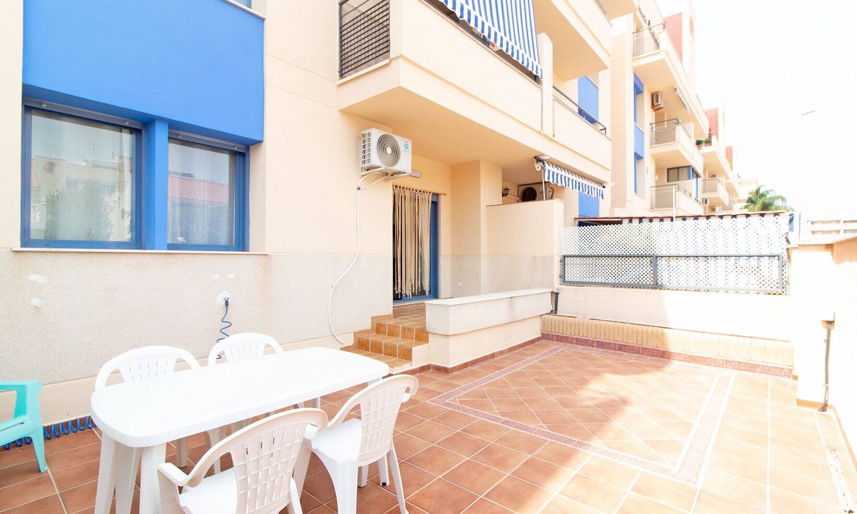 Canet de Berenguer Apartment | Global Vacacional: Apartment with large terrace on Canet beach