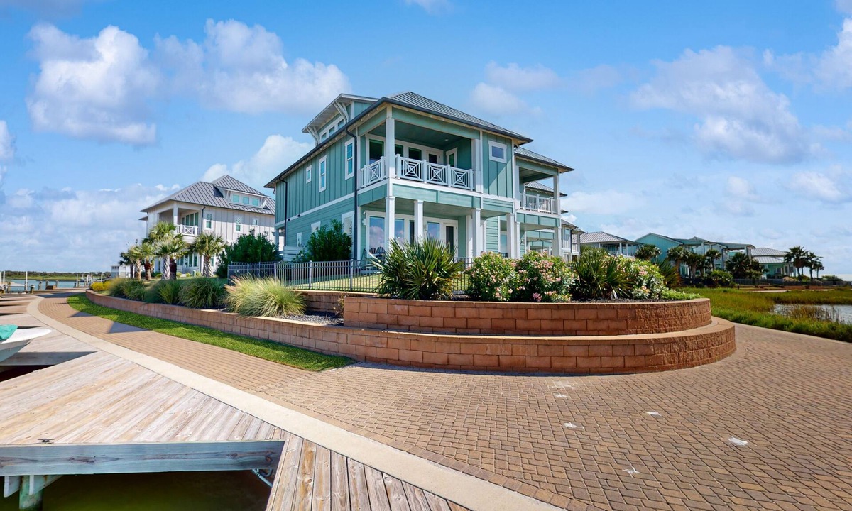 Rockport House | Gorgeous coastal townhome, private patio and shared pool