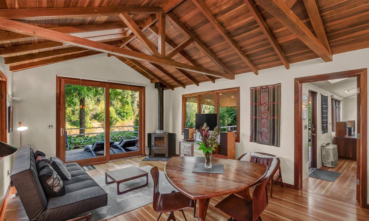 Hacienda Cottage | Gorgeous lush private RIVERFRONT modern cabin