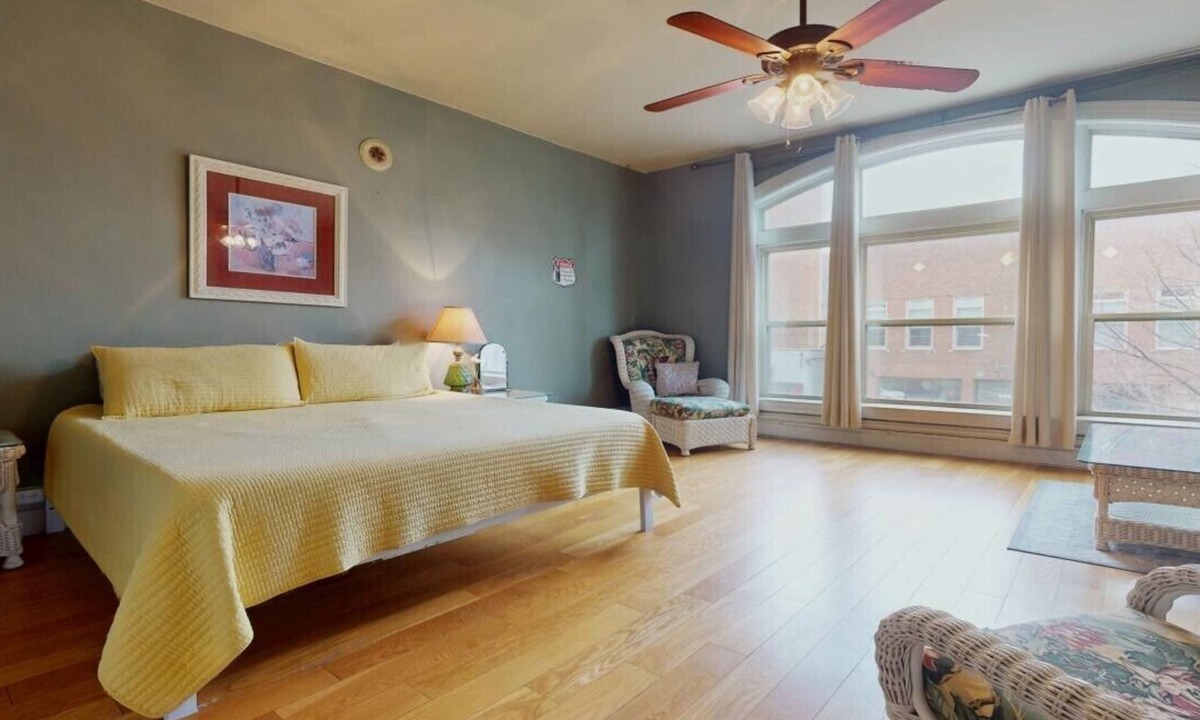 Portsmouth Apartment | Grab a latte at the coffee shop downstairs, then walk a block to the floodwall where you'll find 2000 feet of murals showcasing the history of Portsmouth. After that, walk back up 2nd Street and check out the antique shops and local restaurants.