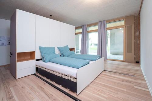 Widnau House | Green studio inside Europes largest hemp building, made by openly