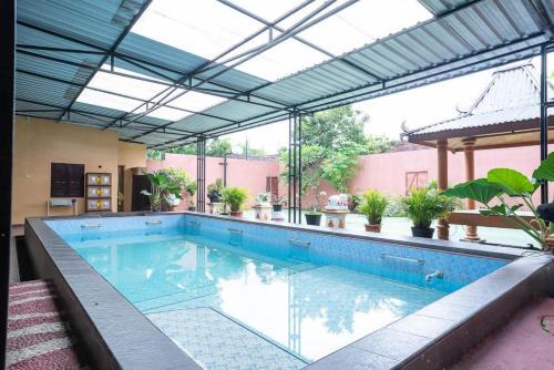 Ngemplak Hotel | Griya Mustika Homestay Syariah Cangkringan Kaliurang RedPartner