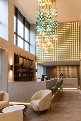 Marly Hotel | Hôtel des Innovations - Hôtel & Appartements - Votre séjour entre Fribourg, ville médiévale et La Gruyère et ses Bains