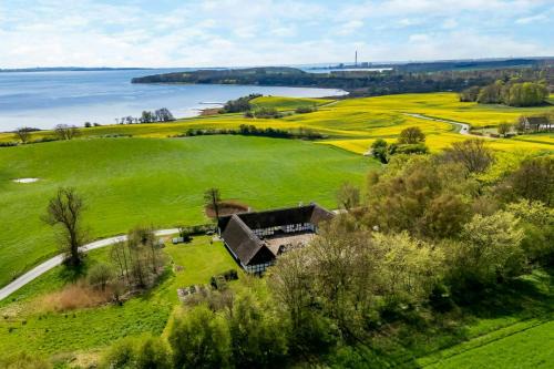 Ronde House | Half-Timbered Farm With Sea View At Kaløvig