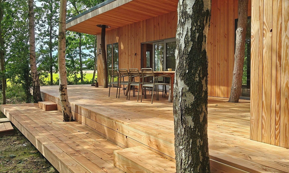 Nakskov House | Handbuilt cottage in untouched forest by Langø