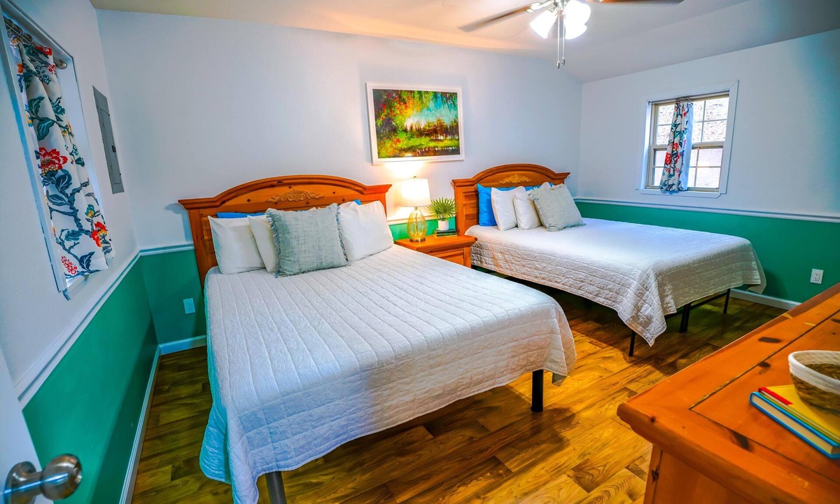 Eddyville Cottage | Heartland Holiday Bungalow - Secluded cabin: 1BR (2Q), 1BA (shower), LR, kitchen, patio, fire pit.