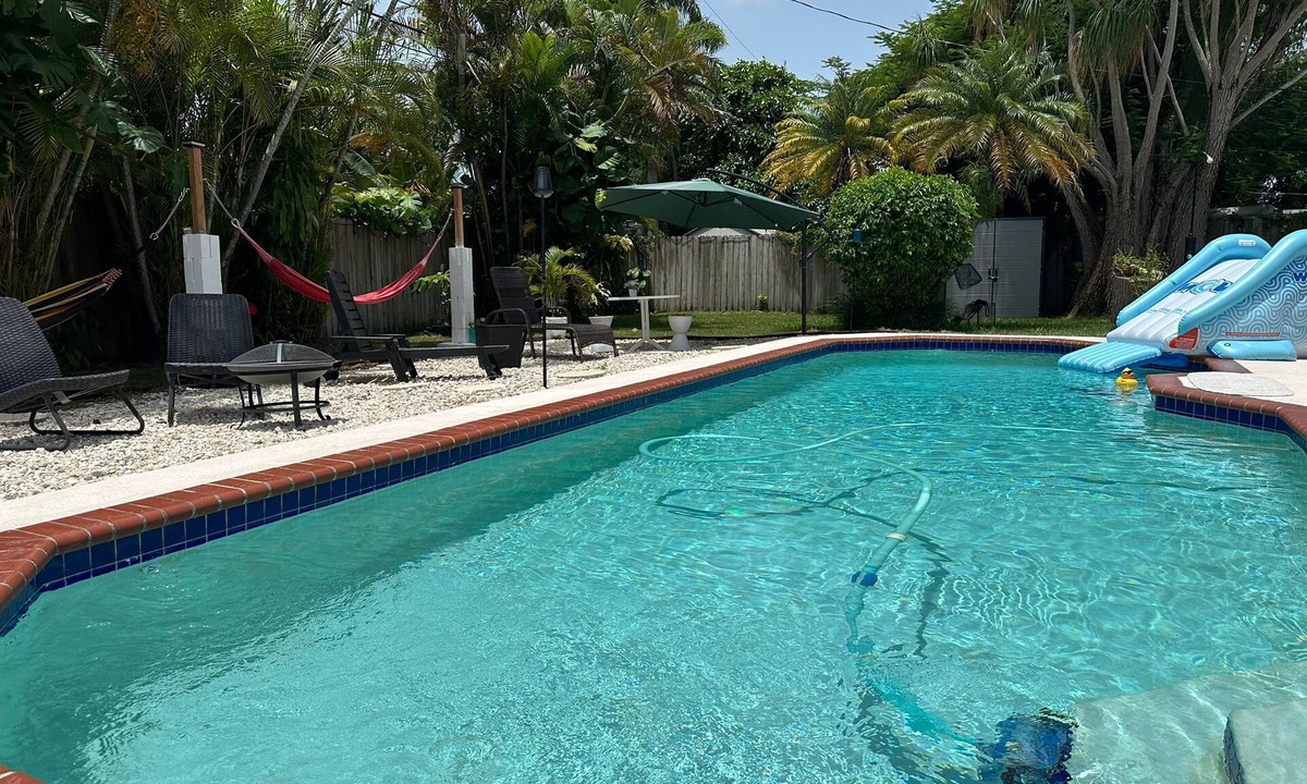 Cutler Bay House | Heated Pool House with Wi-Fi parking available BBQ GRILL(private duplex house)