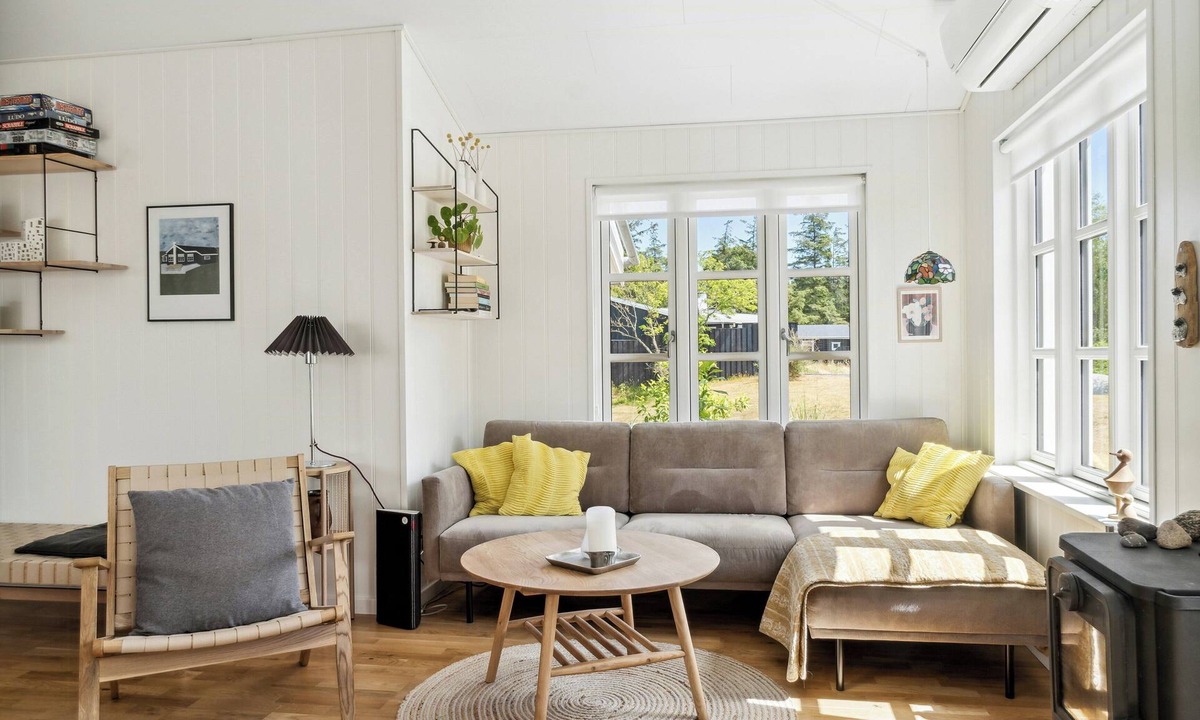 Oster Hurup House | Here, time is tuned into intimacy and coziness