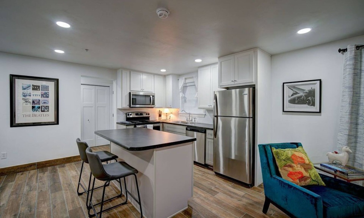 Woodward Apartment | Historic 100+ year old restored 6 unit fully furnished apartment building.
