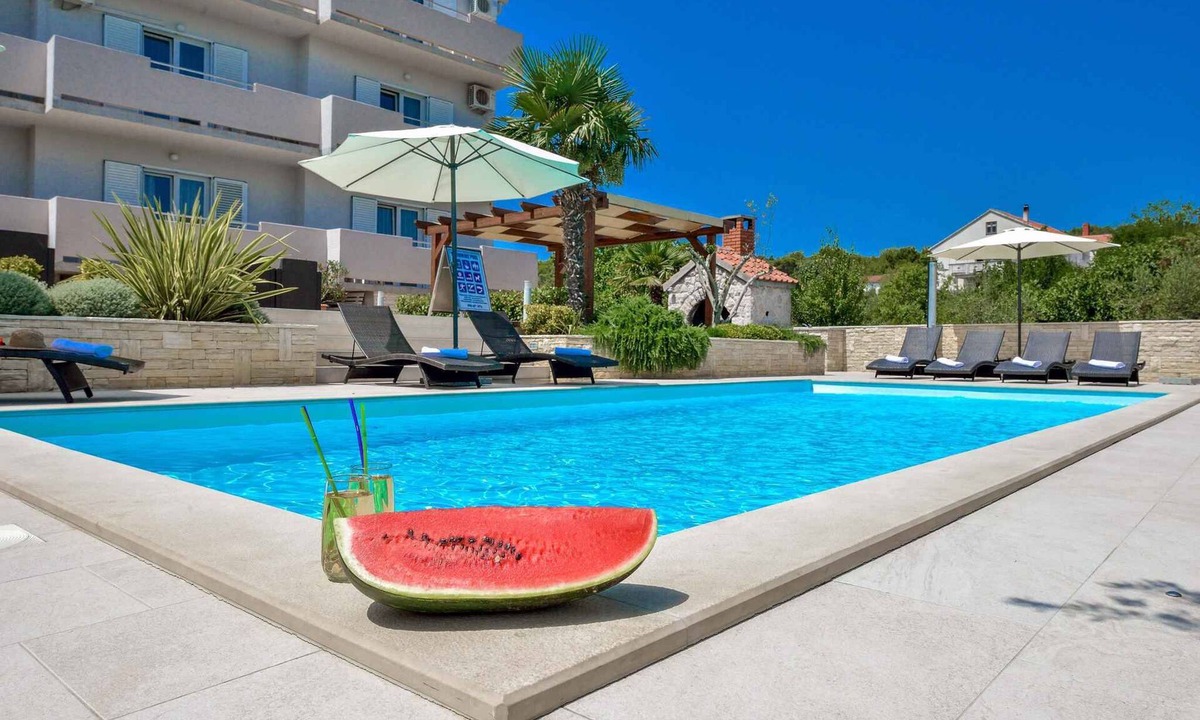 Kukljica Apartment | Holiday apartment with children's playground and pool