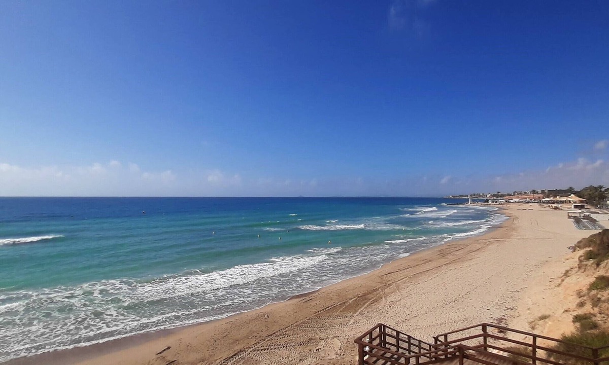 Dehesa de Campoamor House | Holiday Home & Beachside Townhouse & with Sea Views, Shared Pool & Wi-Fi