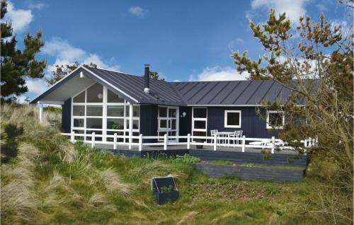 Henne Strand House | Holiday Home Henne With A Fireplace 08
