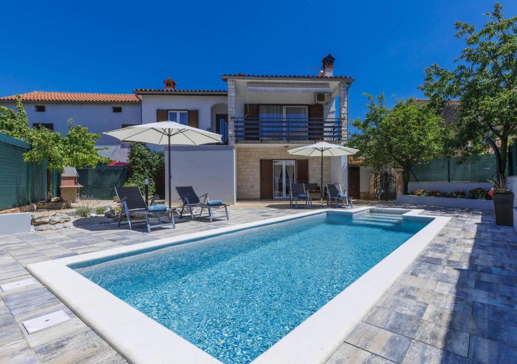 Sajini House | Holiday Home Reaa by Interhome