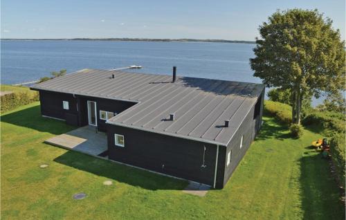 Ronbjerg House | Holiday Home Roslev With A Fireplace 01