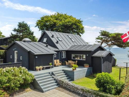 Bjert House | Holiday Home Sten - 30m from the sea by Interhome