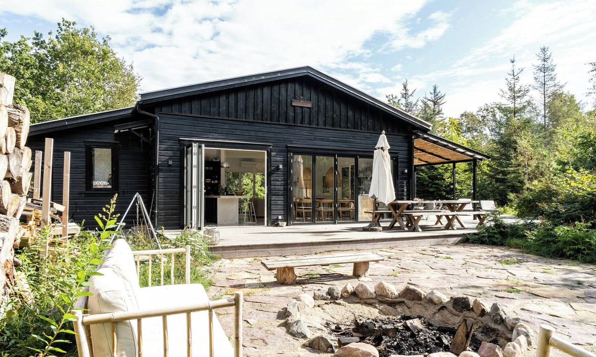 Rrvig House | Home with panoramic windows and stones