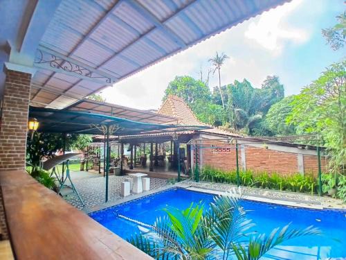Sinduharjo House | Homestay Joglo Seruni Syariah RedPartner