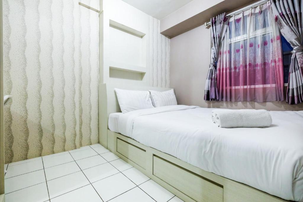 Pancoran Apartment | Homey 2BR Kalibata City Apartment By Travelio