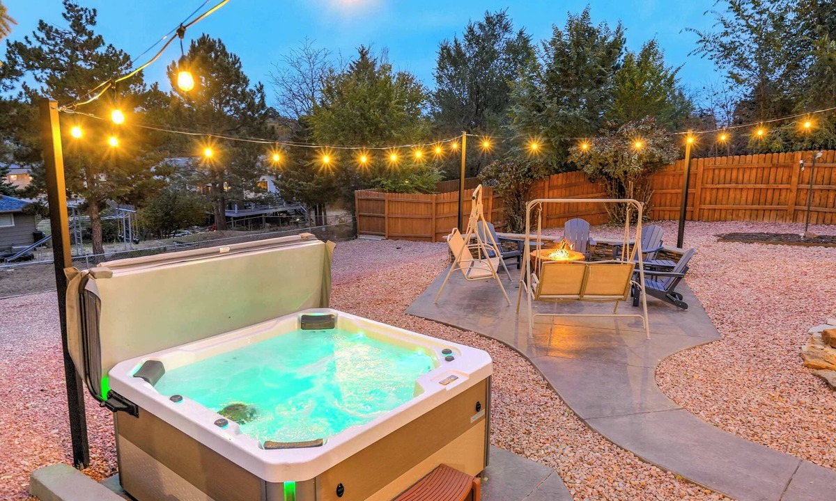 Northeast Colorado Springs House | Hot tub, fire pit, and deck | Mountain view in COS