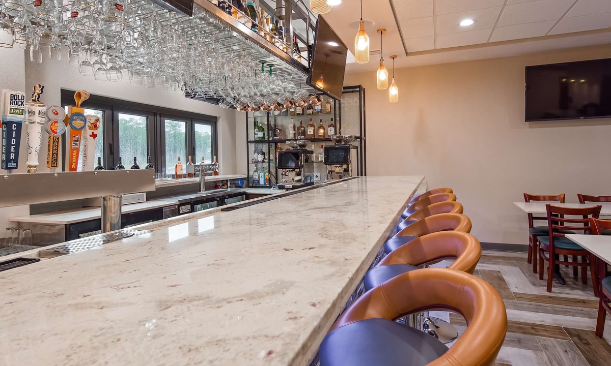 New Caney Hotel | Hotel Manhattan, BW Signature Collection
