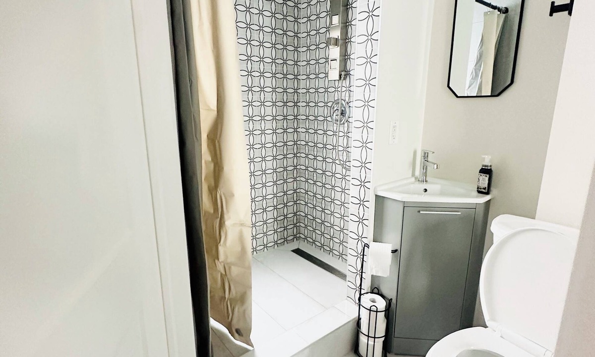 Guelph House | Hotel style private main level if townhome