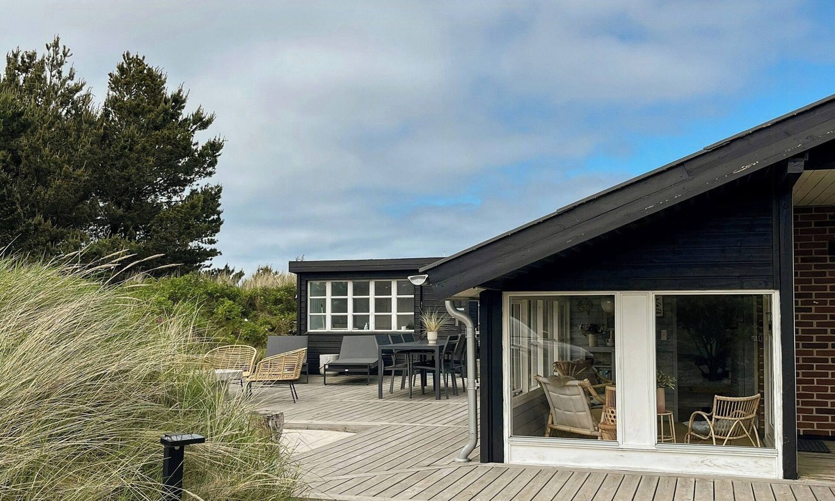 Sondervig House | House among dunes and trees in Søndervig
