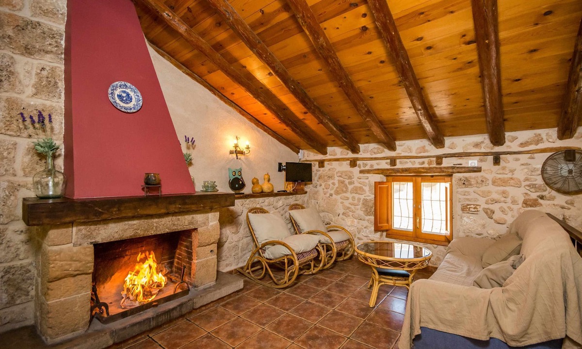 Beceite Apartment | House Ana III. Attic terrace and fireplace