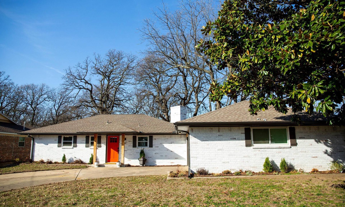 Checotah House | House on the lake with a large sandy beach just steps from the back door.