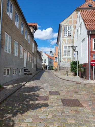 Haderslev Apartment | Hyggelig lejlighed i baggård