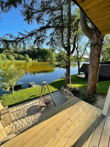 Egedal Kommune House | Hyggelig sommerhus. med udsigt, til vand fra senge