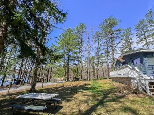 Blakeslee House | Iconic Cabin Hot tub fire pit lakefront dock pet friendly and more