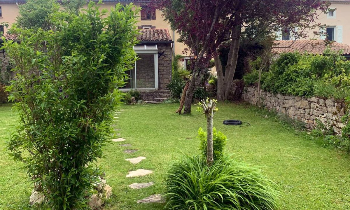 Nebias House | In a garden facing the mountains, a charming little house for 2 people