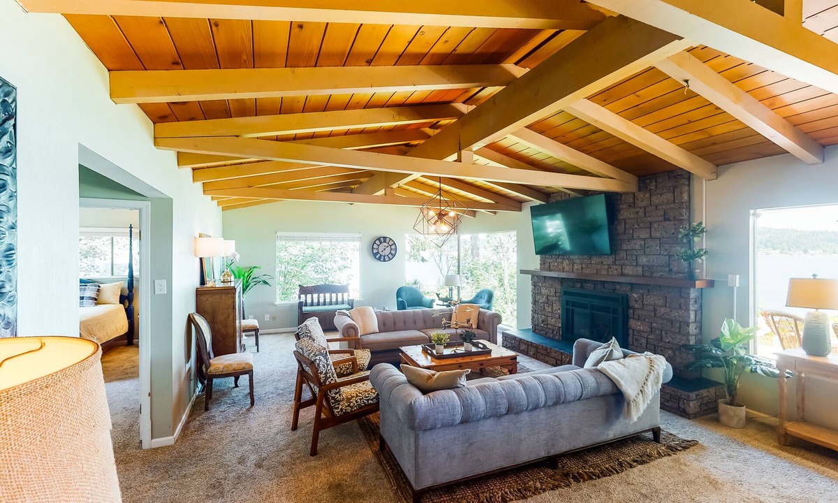 Poulsbo House | Inviting bayside dwelling with beach access, deck, waterfront views, & fireplace