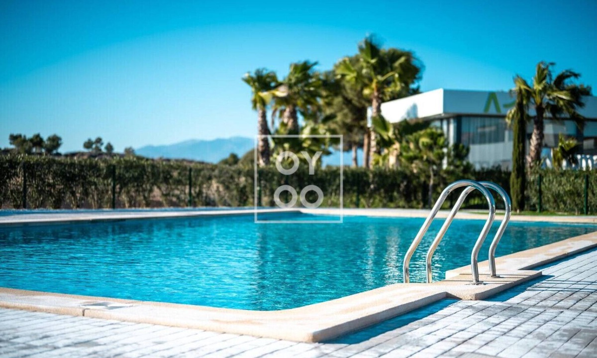 Alhama de Murcia Apartment | Isla de la Sierra: Resort apt, pool, private garden, mountain views - by OYOOSTAYS
