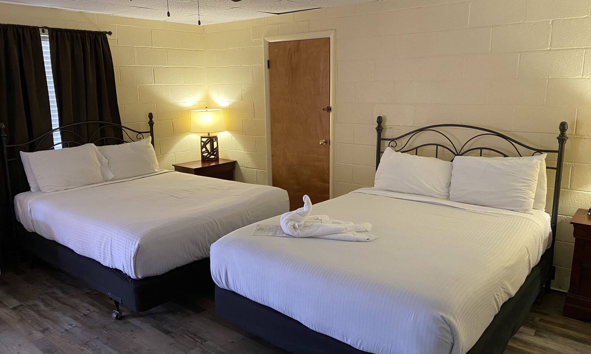 Mount Ida Hotel | JI8, Queen Guest Room at the Joplin Inn at entrance to the resort, , just 2 1/2 miles from Lake Ouachita. by RedAwning