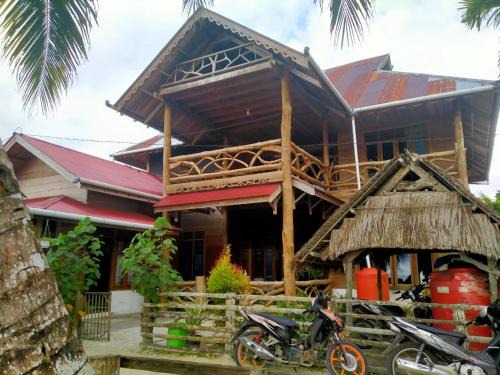 Pulau Masokut Hostel | Kutnalek Surf Camp Surfing barrels front E"bay,beng-beng,pistop,nipussi wave just minute with speed boat