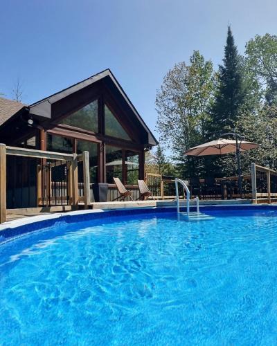 Saint-Faustin-Lac-Carre Ski Chalet | La Canopée - Piscine privée chauffée - Spa - Mont-Blanc