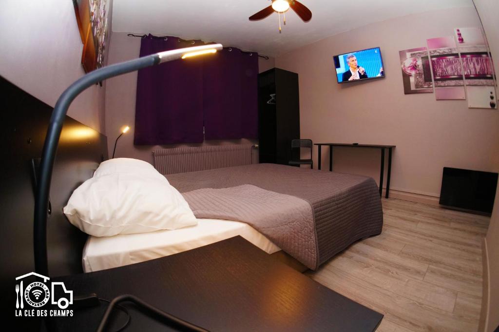 Champigny Hotel | La Clé des Champs