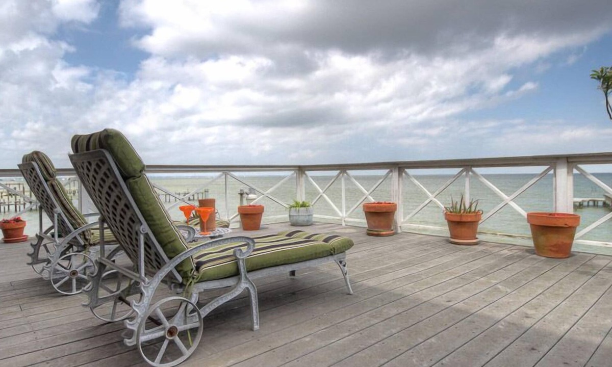 Bacliff Cottage | La Petit Maison, is a waterfront two-story cottage near Kemah,TX