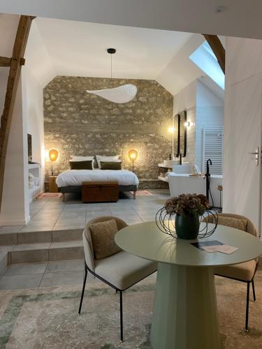 Ay Bed & Breakfast | La Suite Arbane - chambre d'hôtes avec sauna chez le vigneron