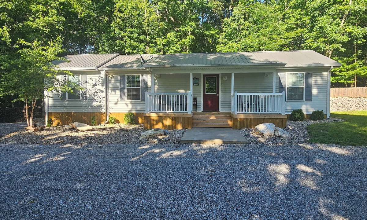 Kuttawa House | Lake House with easy water access, limited water view, sitting on 4 acres.