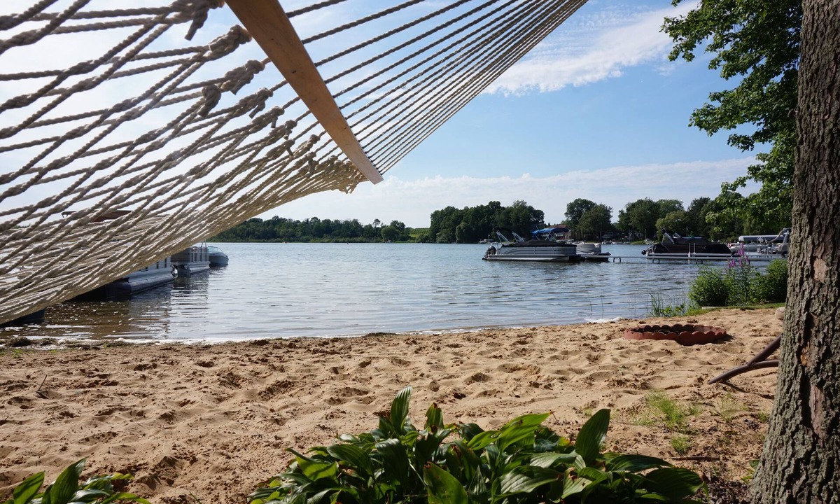Fennville House | Lake house with private sandy beach on Hutchins Lake!