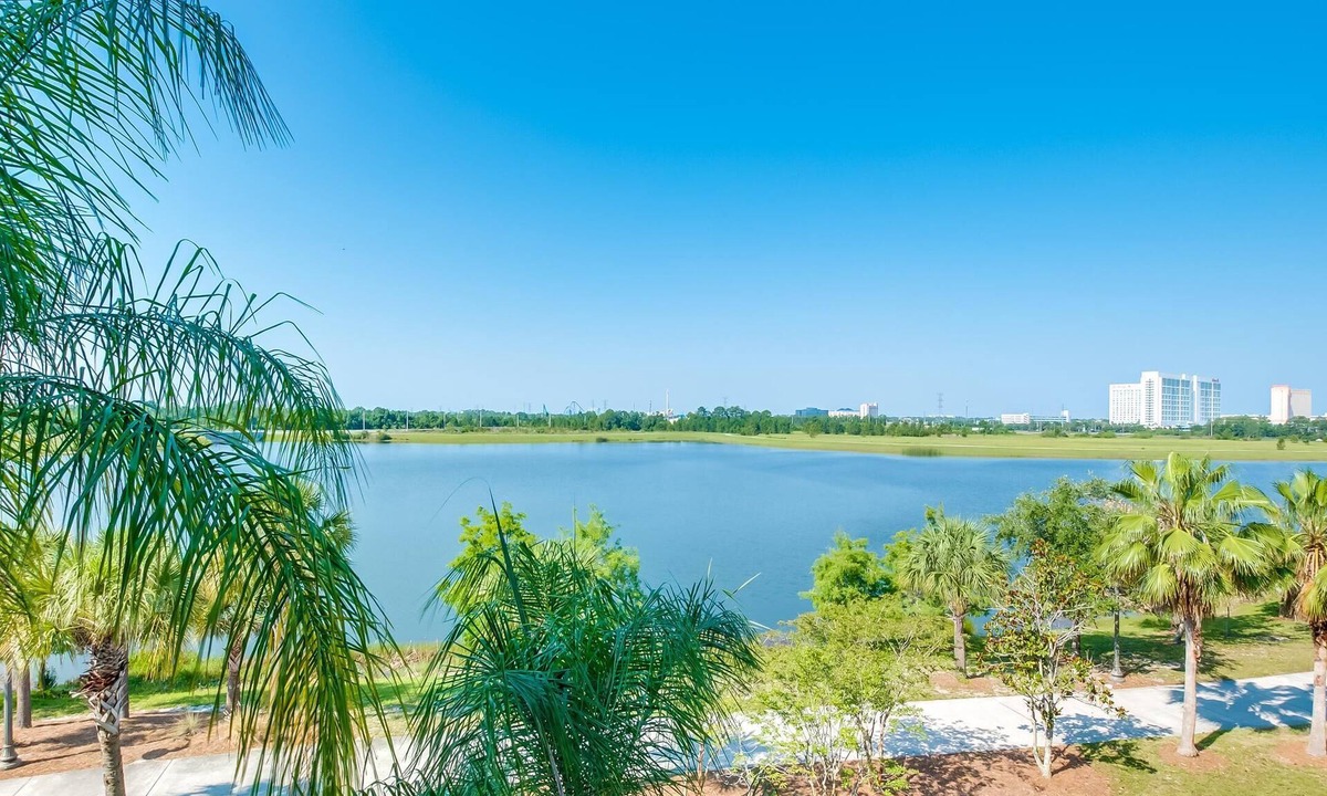 Florida Central Atlantic Coast Condo | Lake & Pool View Fireworks Vista Cay 2 Bed 2 Bathroom Stunning